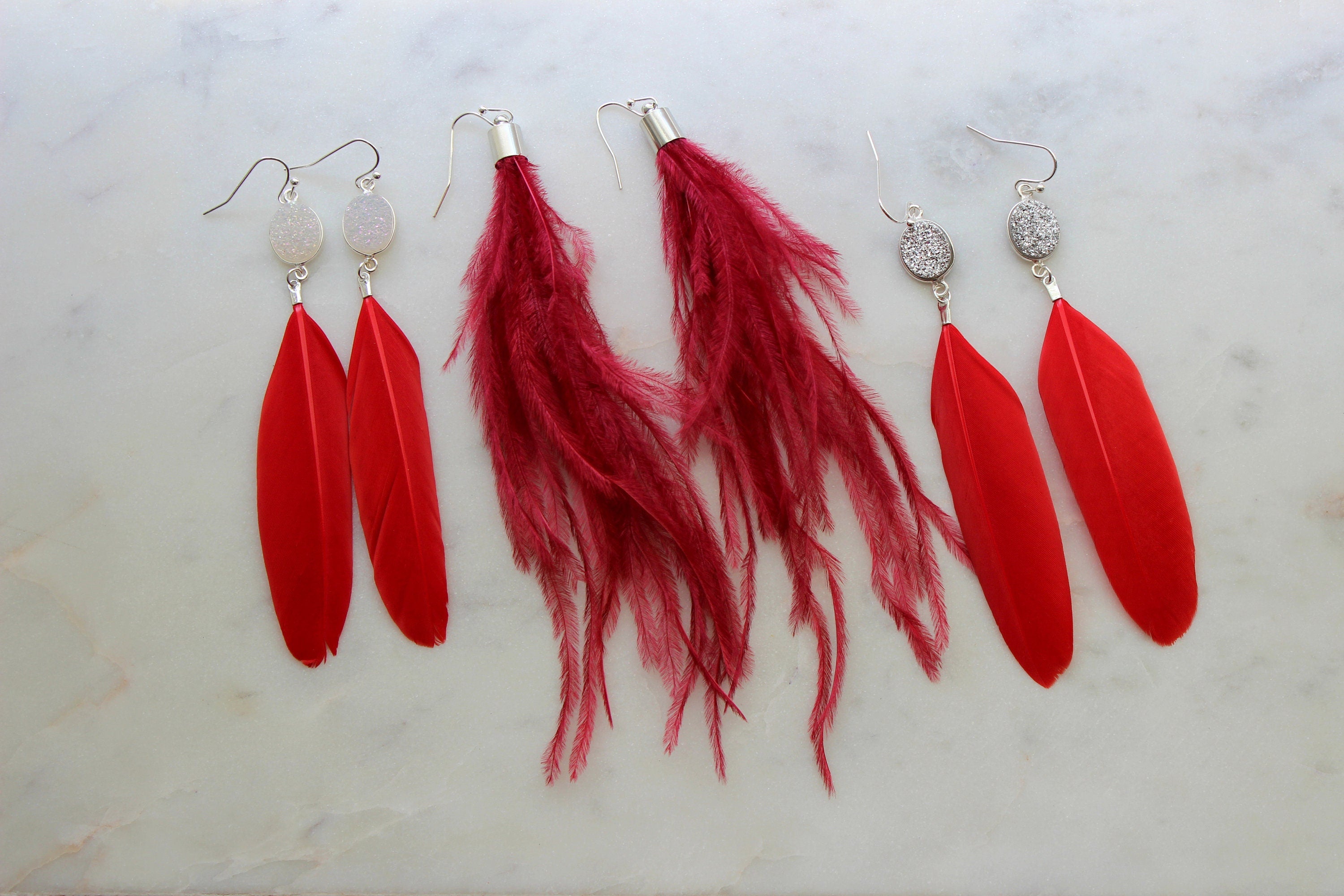 Red on sale feather earrings